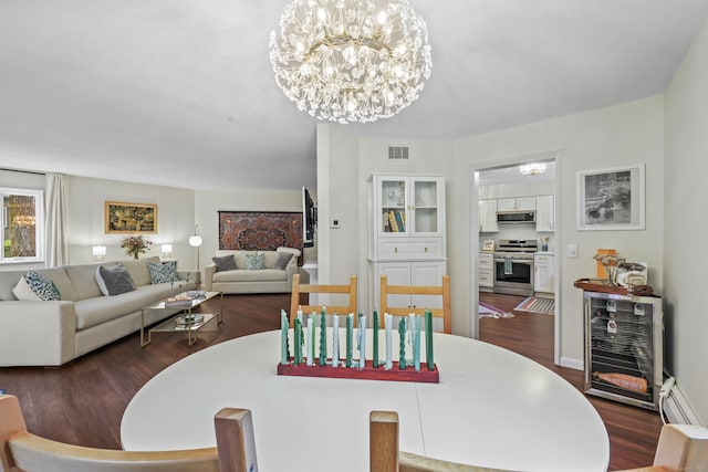 12 Byrne Ct Unit D, Farmington, CT 06032 - dining area featuring a chandelier, dark wood-type flooring, and baseboard heating