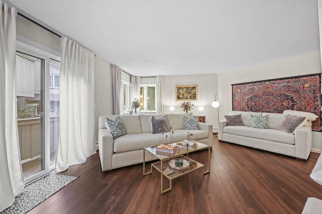 12 Byrne Ct Unit D, Farmington, CT 06032 - living room with dark wood finished floors and baseboard heating