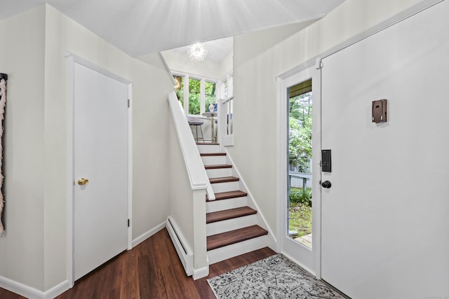 12 Byrne Ct Unit D, Farmington, CT 06032 - foyer with baseboard heating, wood finished floors, a chandelier, and stairway
