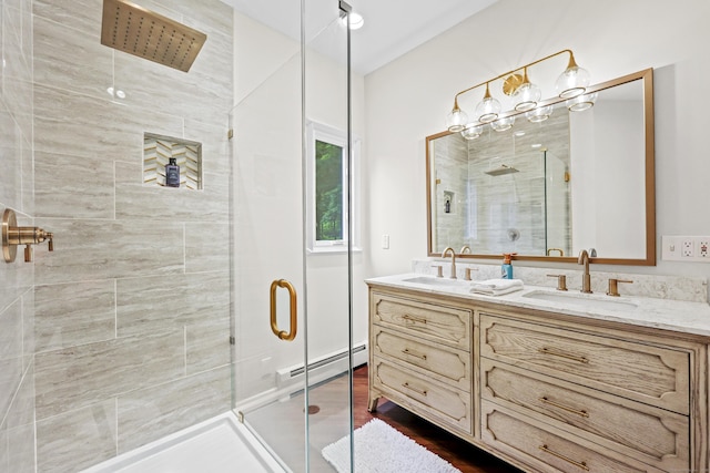 12 Byrne Ct Unit D, Farmington, CT 06032 - full bath with a baseboard radiator, a stall shower, and double vanity