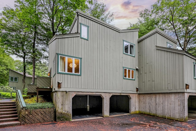 12 Byrne Ct Unit D, Farmington, CT 06032 - view of home's exterior with an attached garage and asphalt driveway