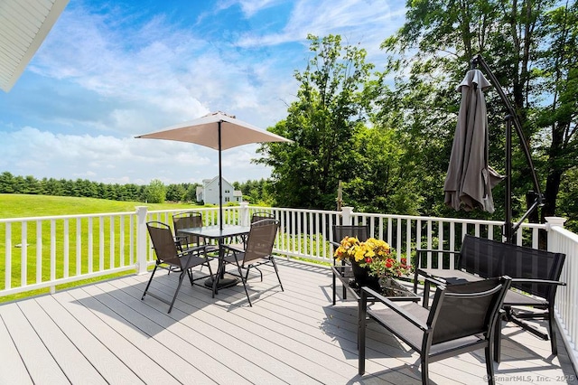 171 Judd Hill Rd, Middlebury, CT 06762 - wooden deck featuring outdoor dining space, a lawn, and view of scattered trees
