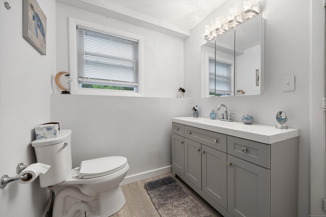 489 Thomaston Rd, Watertown, CT 06795 - bathroom with vanity and wood finished floors