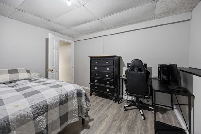 489 Thomaston Rd, Watertown, CT 06795 - bedroom with a drop ceiling, wood finished floors, and a desk