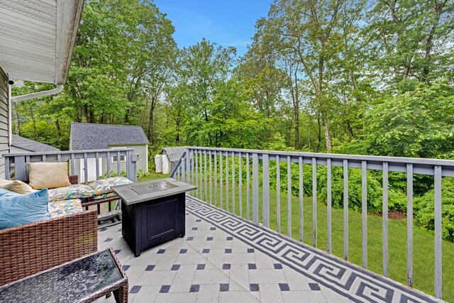 489 Thomaston Rd, Watertown, CT 06795 - view of patio / terrace featuring a fire pit and an outbuilding