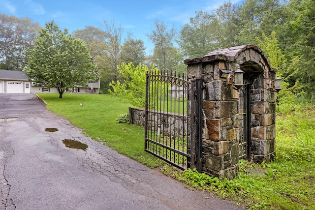 489 Thomaston Rd, Watertown, CT 06795 - gate featuring a lawn
