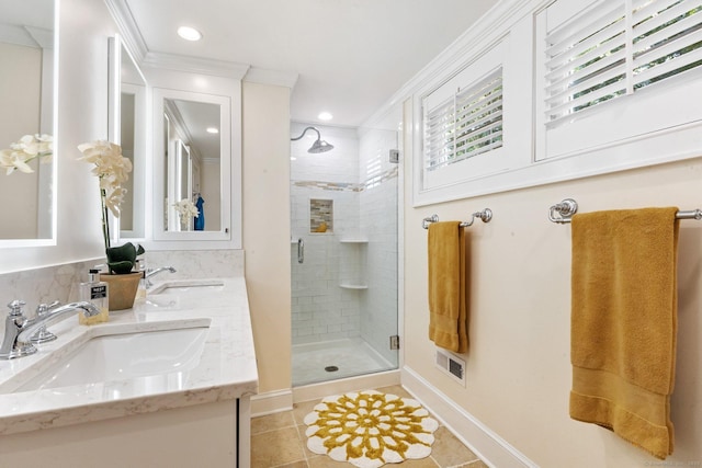 5 Lookout Rd, Norwalk, CT 06850 - full bath with tile patterned floors, double vanity, a shower stall, crown molding, and recessed lighting