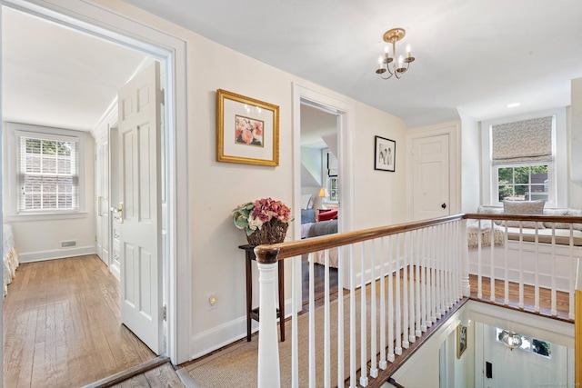 5 Lookout Rd, Norwalk, CT 06850 - hallway featuring a chandelier and wood finished floors