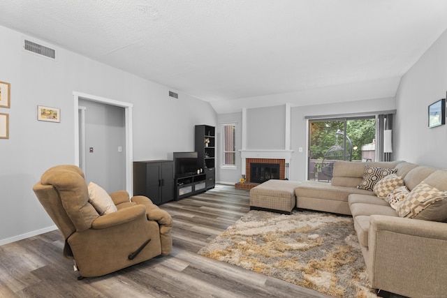 21 Heritage Cir Unit A, Southbury, CT 06488 - living room with wood finished floors and a brick fireplace
