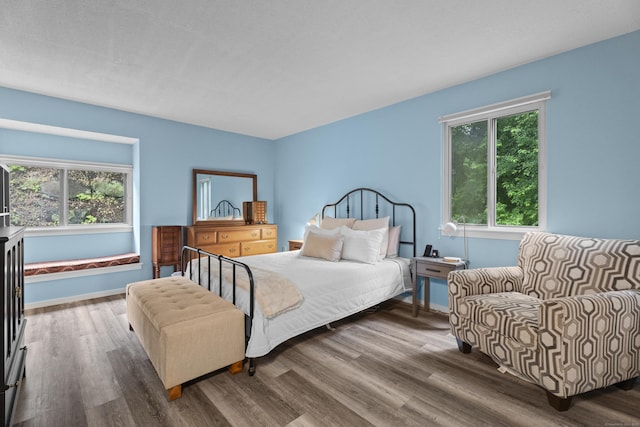 21 Heritage Cir Unit A, Southbury, CT 06488 - bedroom with multiple windows and wood finished floors