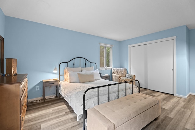 21 Heritage Cir Unit A, Southbury, CT 06488 - bedroom with light wood-type flooring and a closet