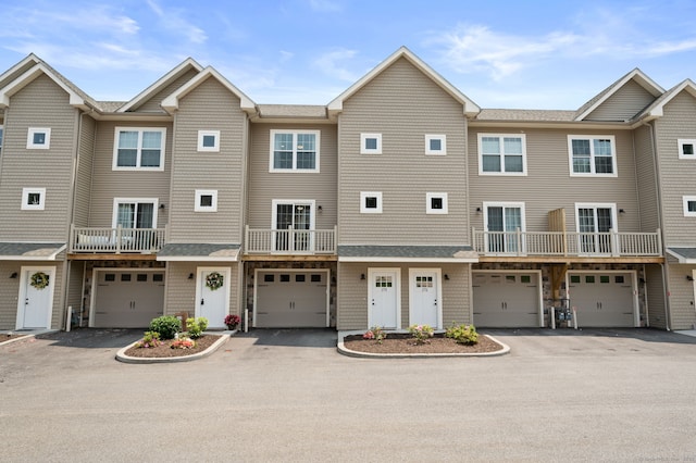 64 Scotch Cap Rd Unit 173, Waterford, CT 06375 - view of front of property featuring driveway and an attached garage