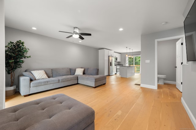 64 Scotch Cap Rd Unit 173, Waterford, CT 06375 - living area with light wood-style flooring, a ceiling fan, and recessed lighting