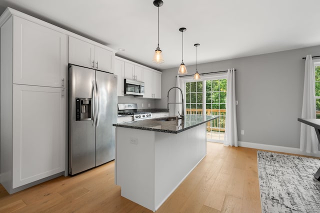 64 Scotch Cap Rd Unit 173, Waterford, CT 06375 - kitchen with appliances with stainless steel finishes, light wood-style floors, and plenty of natural light