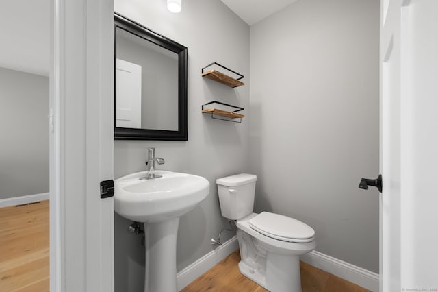 64 Scotch Cap Rd Unit 173, Waterford, CT 06375 - bathroom featuring baseboards and wood finished floors