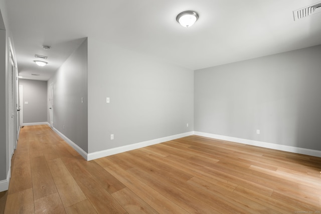 64 Scotch Cap Rd Unit 173, Waterford, CT 06375 - empty room featuring light wood-style floors and a smoke detector