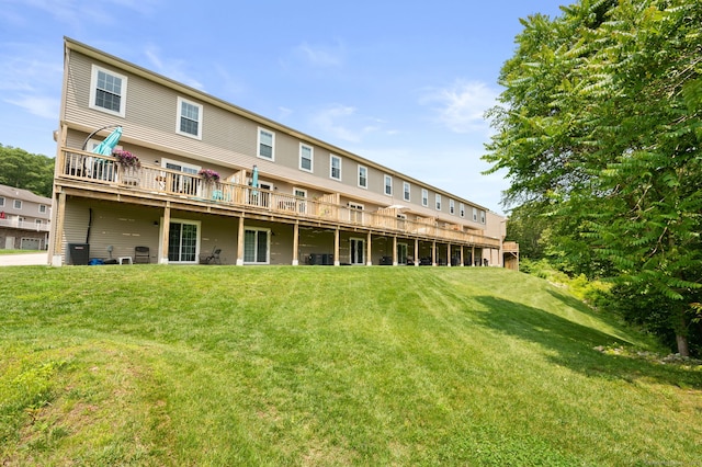 64 Scotch Cap Rd Unit 173, Waterford, CT 06375 - rear view of property with a yard and a wooden deck