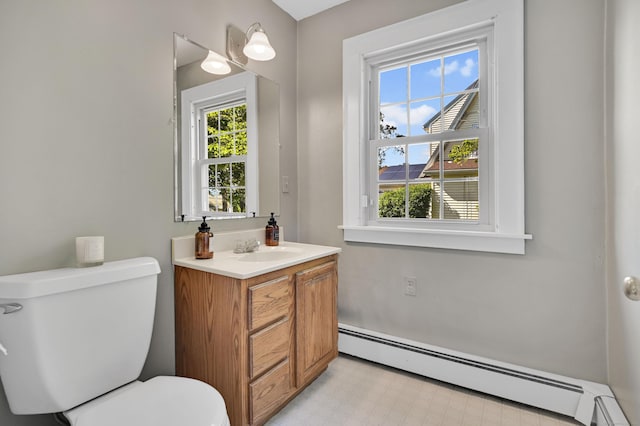 133 Griswold Rd, Wethersfield, CT 06109 - bathroom with a baseboard radiator, vanity, and tile patterned floors