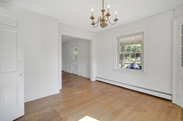 133 Griswold Rd, Wethersfield, CT 06109 - unfurnished dining area featuring baseboard heating, a chandelier, healthy amount of natural light, and light wood-style floors