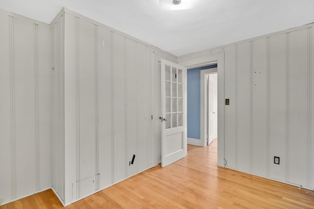 133 Griswold Rd, Wethersfield, CT 06109 - empty room featuring light wood-style flooring and a decorative wall