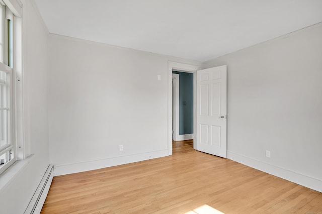 133 Griswold Rd, Wethersfield, CT 06109 - spare room featuring baseboard heating and light wood-style flooring