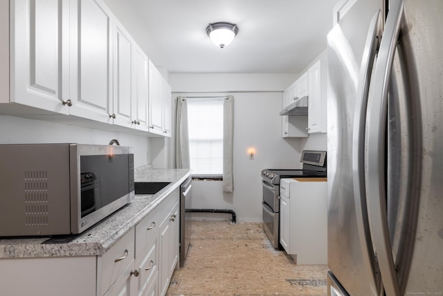 510 S St S, Bristol, CT 06010 - kitchen with stainless steel appliances, under cabinet range hood, white cabinets, and light countertops