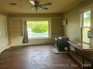 1063 N Main St, Killingly, CT 06241 - interior space with plenty of natural light and a wood stove