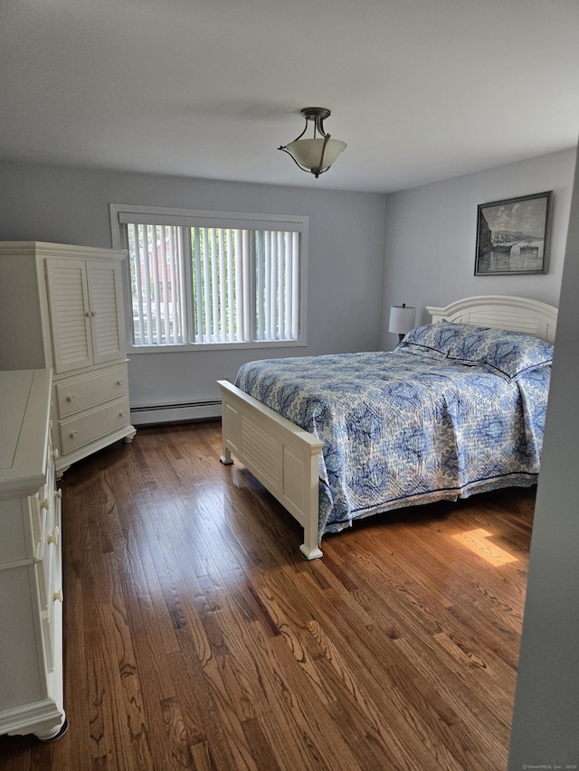 118 Harding Ave, Newington, CT 06111 - bedroom featuring a baseboard heating unit and dark wood-type flooring