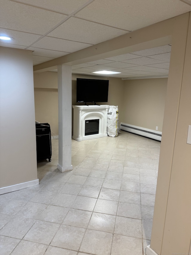 118 Harding Ave, Newington, CT 06111 - unfurnished living room featuring baseboard heating, a drop ceiling, tile patterned floors, and a fireplace