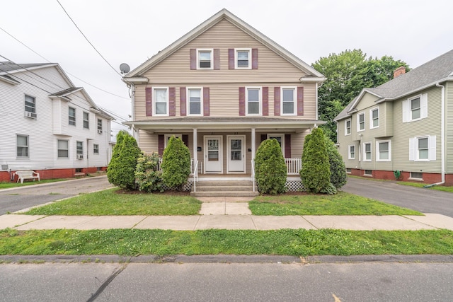 21 Bigelow Ave, Enfield, CT 06082 - traditional style home featuring a porch