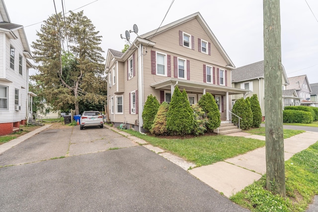 21 Bigelow Ave, Enfield, CT 06082 - american foursquare style home with a porch and driveway