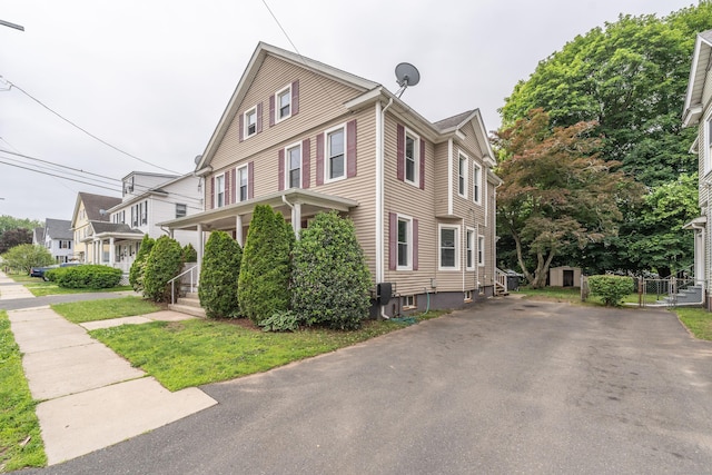 21 Bigelow Ave, Enfield, CT 06082 - view of home's exterior featuring driveway