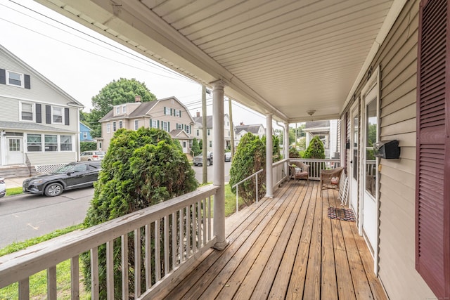21 Bigelow Ave, Enfield, CT 06082 - wooden porch featuring a residential view