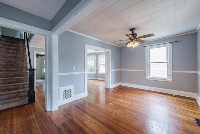 21 Bigelow Ave, Enfield, CT 06082 - empty room featuring ceiling fan, stairway, hardwood / wood-style flooring, and crown molding