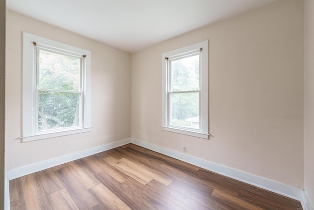 21 Bigelow Ave, Enfield, CT 06082 - spare room with healthy amount of natural light and wood finished floors