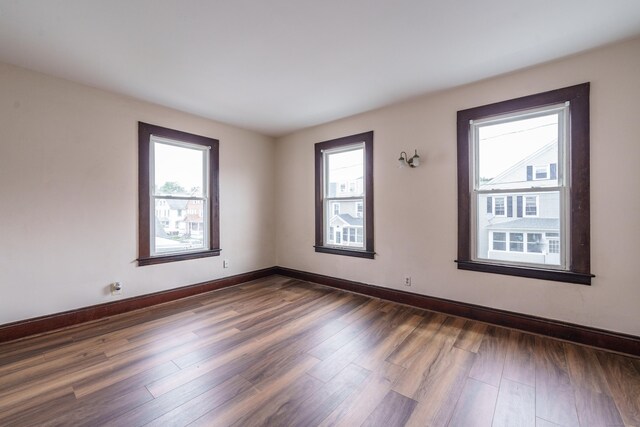 21 Bigelow Ave, Enfield, CT 06082 - unfurnished room featuring dark wood-type flooring and baseboards