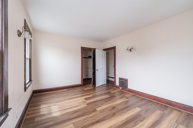 21 Bigelow Ave, Enfield, CT 06082 - unfurnished bedroom with wood finished floors and a closet