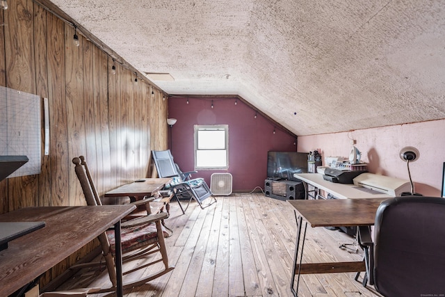 21 Bigelow Ave, Enfield, CT 06082 - office area with light wood-style floors, lofted ceiling, and wood walls