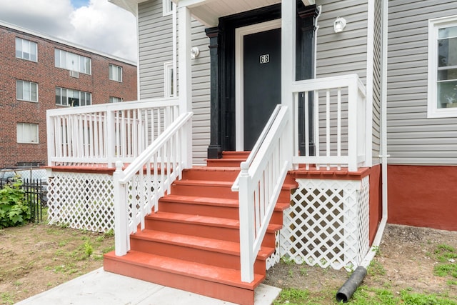 68 School St, Hartford, CT 06106 - doorway to property featuring covered porch