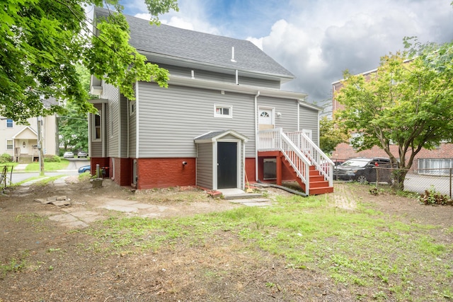 68 School St, Hartford, CT 06106 - back of house featuring a shingled roof and stairs