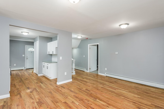 68 School St, Hartford, CT 06106 - spare room featuring a baseboard radiator and light wood-style flooring