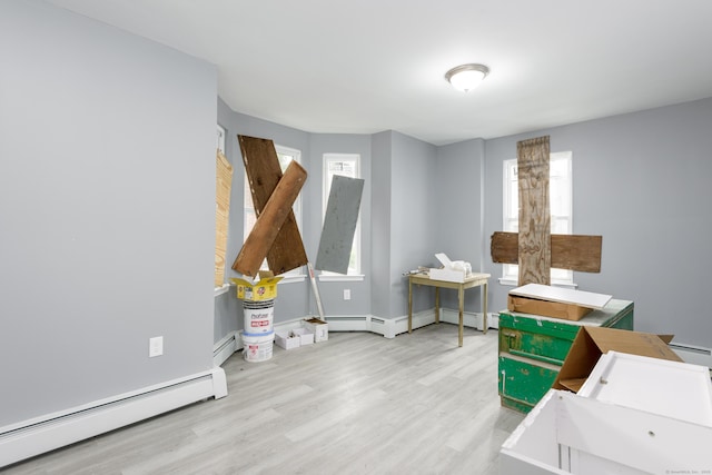 68 School St, Hartford, CT 06106 - misc room featuring baseboard heating, wood finished floors, healthy amount of natural light, and an office area