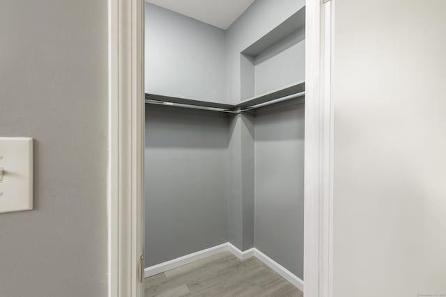 68 School St, Hartford, CT 06106 - walk in closet with light wood-style floors