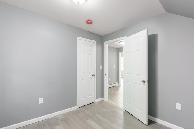 68 School St, Hartford, CT 06106 - unfurnished bedroom with light wood-type flooring and a baseboard radiator