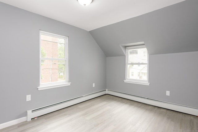 68 School St, Hartford, CT 06106 - additional living space with baseboard heating, light wood-style flooring, and vaulted ceiling