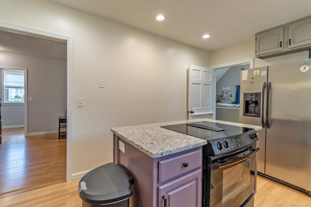 263 New Britain Ave, Newington, CT 06111 - kitchen with black electric range oven, stainless steel refrigerator with ice dispenser, light wood-style floors, a kitchen island, and recessed lighting