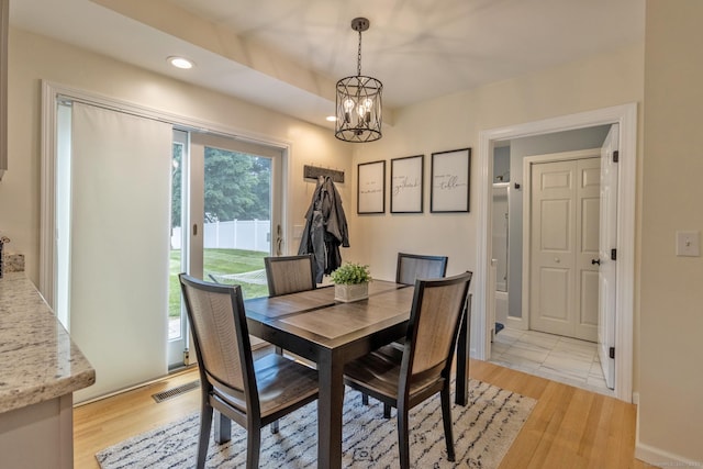 263 New Britain Ave, Newington, CT 06111 - dining room with a chandelier, recessed lighting, and light wood-type flooring