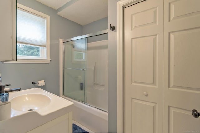 263 New Britain Ave, Newington, CT 06111 - bathroom with combined bath / shower with glass door and vanity