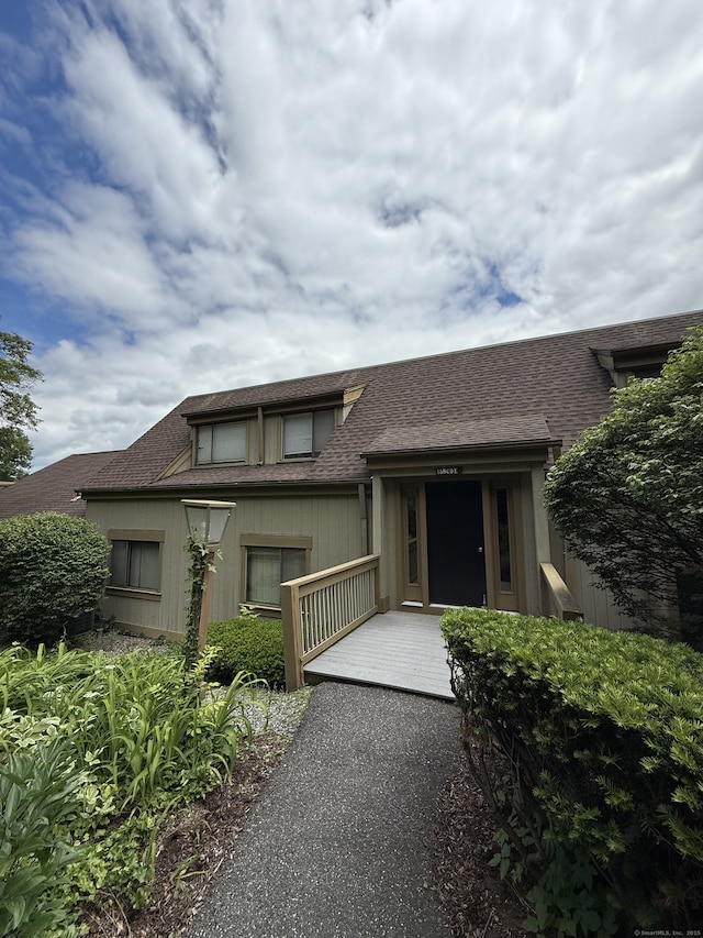 13 Heritage Vlg Unit E, Southbury, CT 06488 - view of front of house featuring roof with shingles