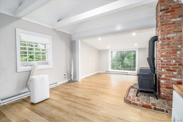 69 Forest Dr, Newtown, CT 06482 - unfurnished living room with a wood stove, baseboard heating, healthy amount of natural light, light wood-style floors, and recessed lighting